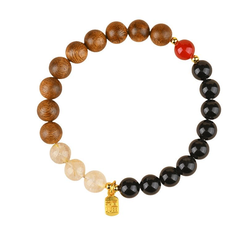 Bracelet: brown agarwood, black agate and pale quartz beads with one red bead, second view
