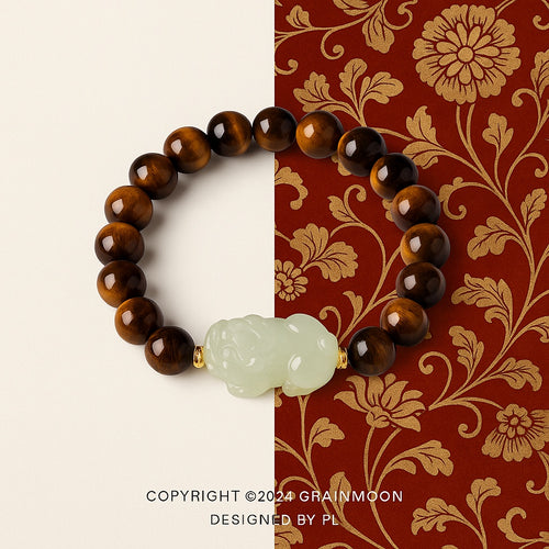 Bracelet: brown tiger's eye beads with a pale green Hetian jade Pixiu carving