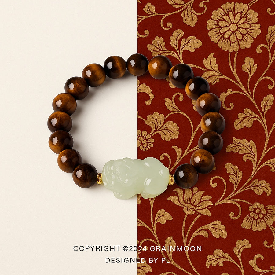 Bracelet: brown tiger's eye beads with a pale green Hetian jade Pixiu carving
