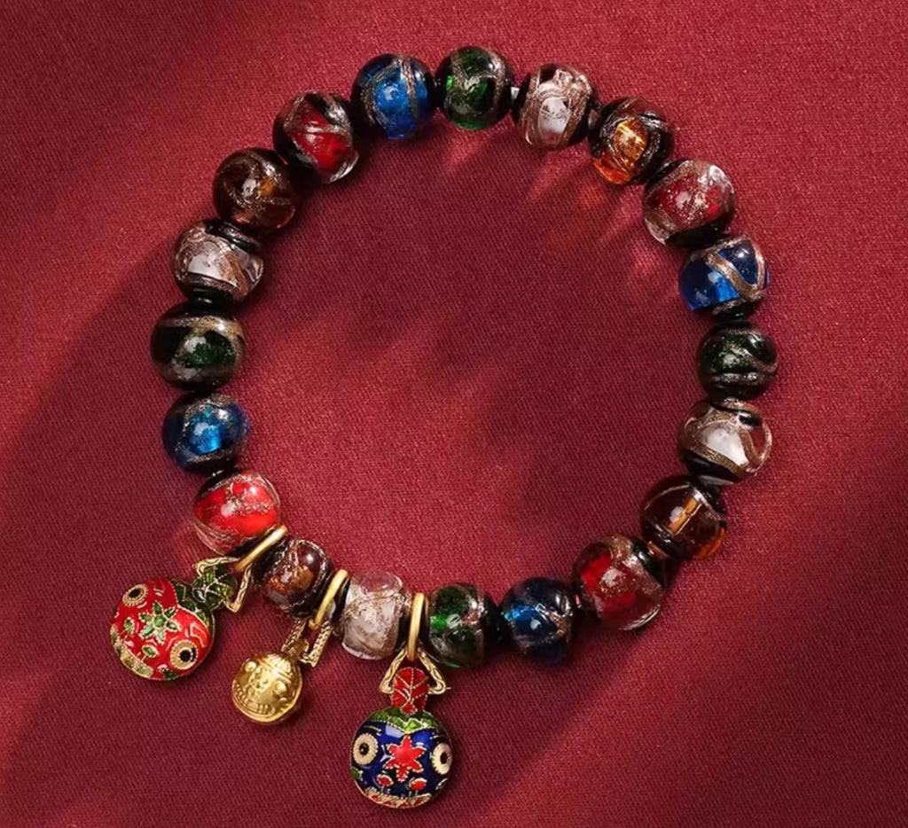 Bracelet: kiln-fired liuli glass beads in red, blue, green, white and brown, fourth view