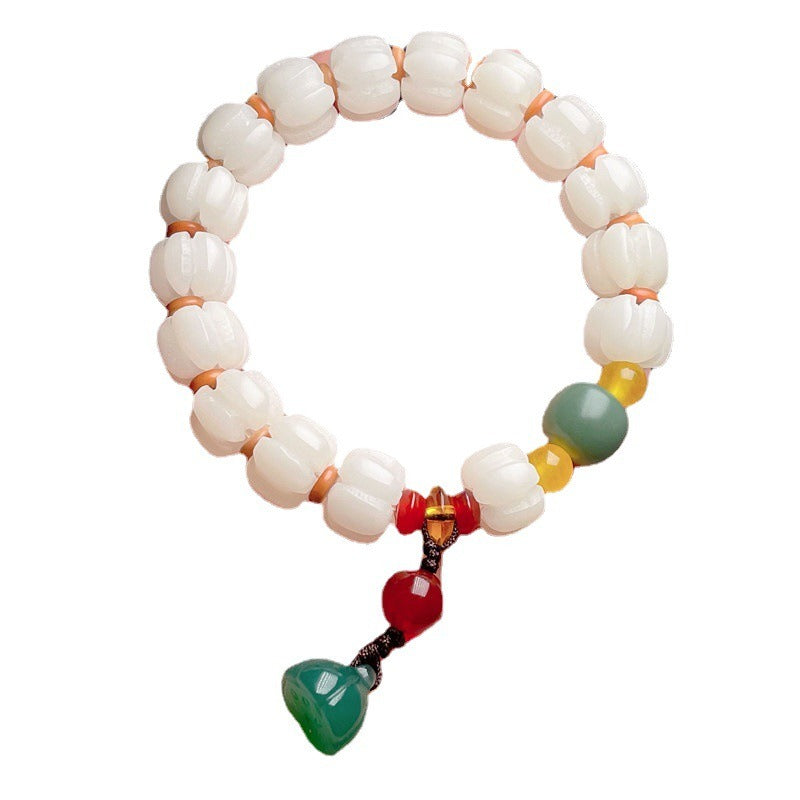 Bracelet: white pumpkin-shaped bodhi root beads with yellow, green and red accents, third view