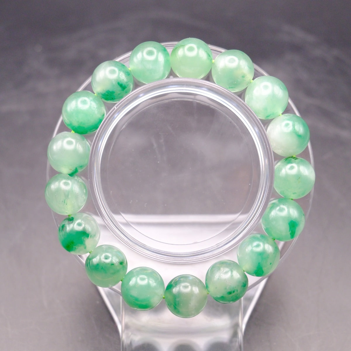 Bracelet: round translucent green African Jade beads, 10mm, third view