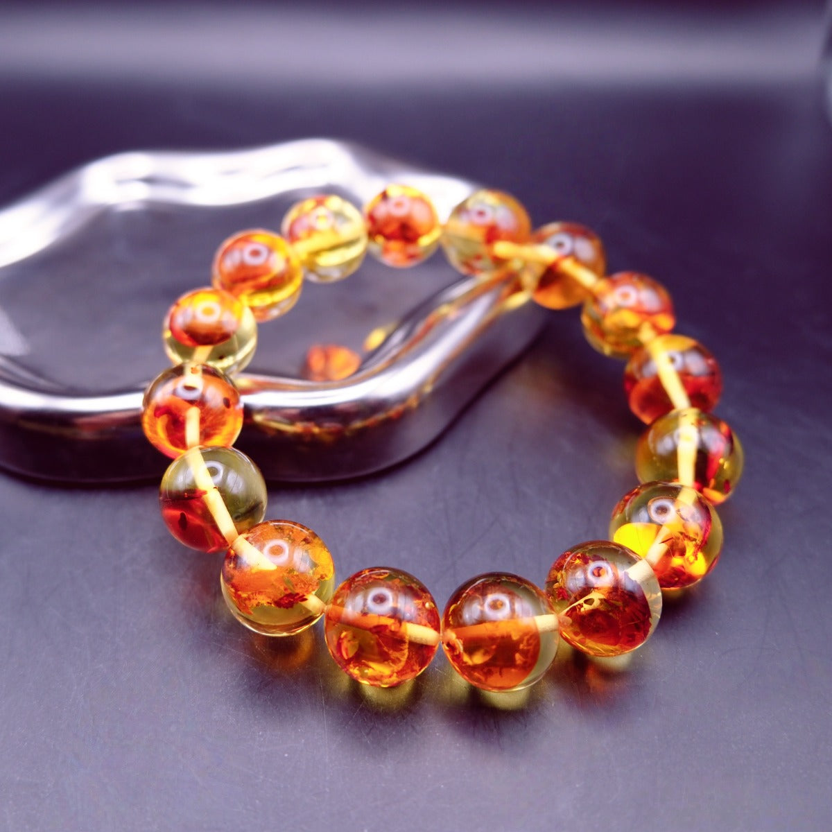 Bracelet: transparent golden flower amber beads, 12mm, second view