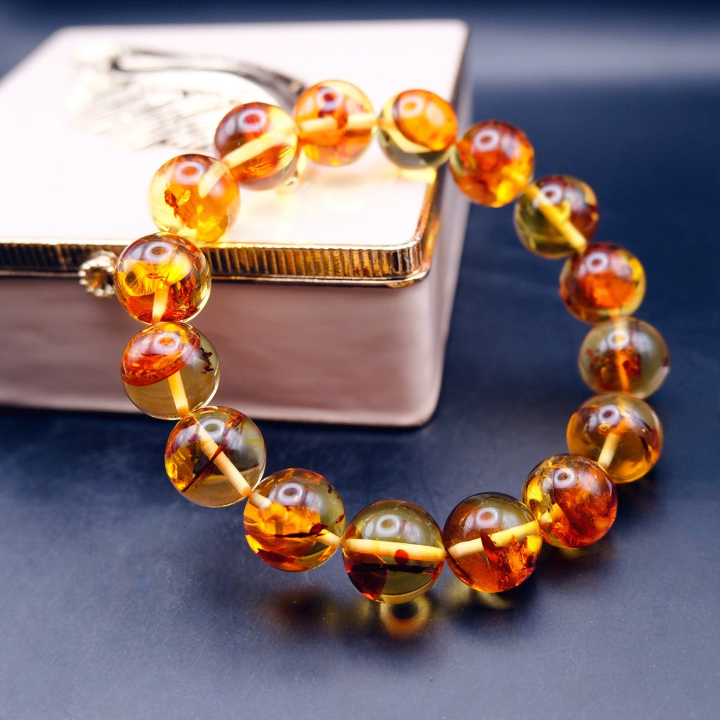 Bracelet: transparent golden flower amber beads, 12mm, fourth view