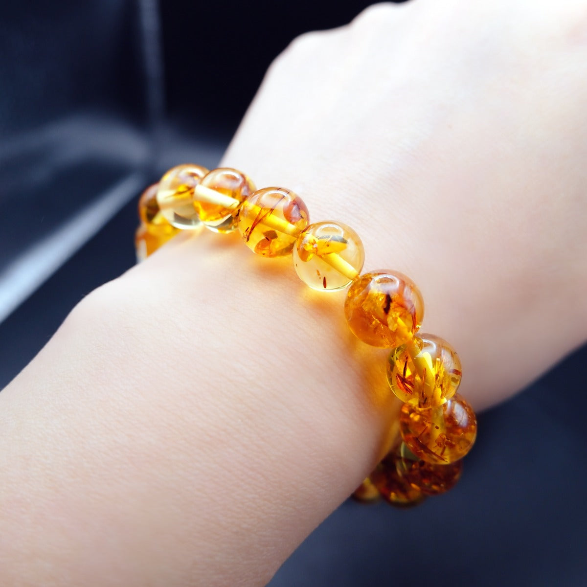 Bracelet: transparent golden flower amber beads, 9-10mm, third view