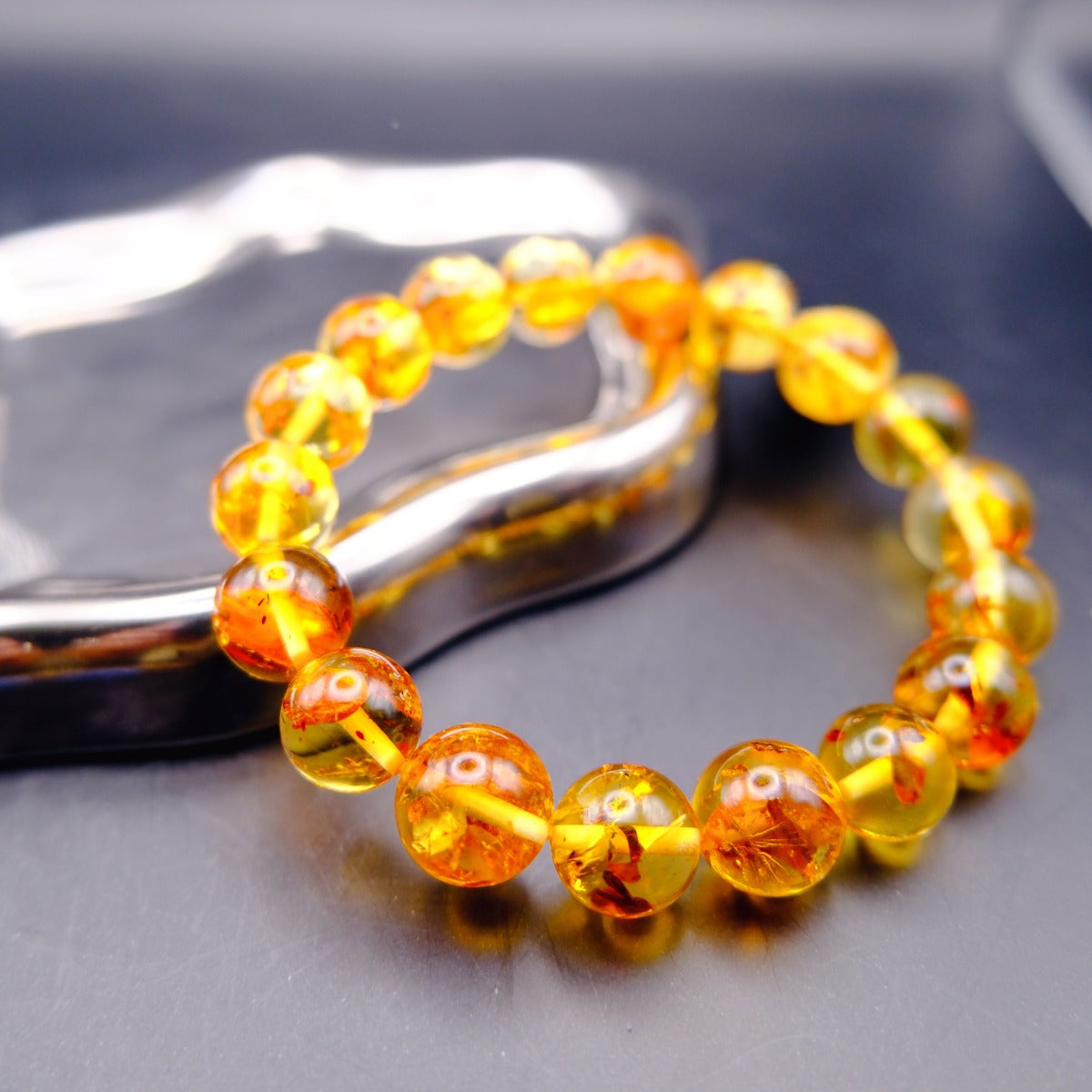 Bracelet: transparent golden flower amber beads, 9-10mm, fourth view