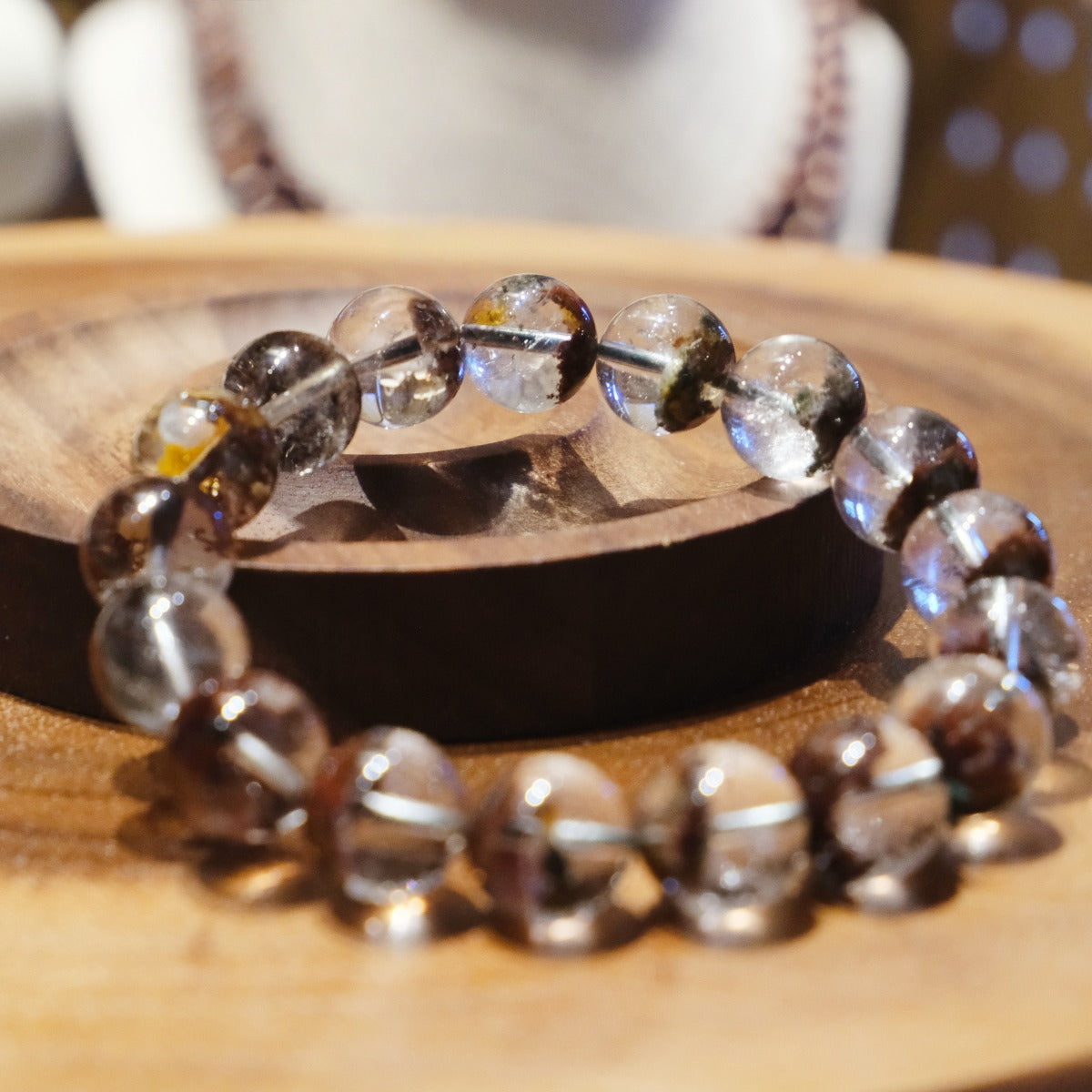 Bracelet: clear red phantom quartz beads, 11mm, with red-brown inclusions, second view