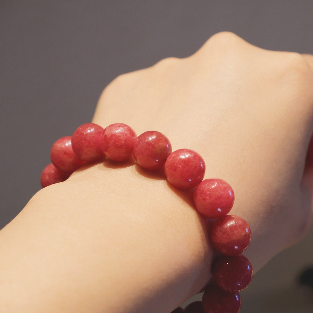Bracelet: round pink rhodonite beads, 10mm, with black veining, second view