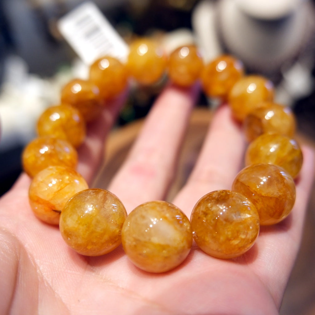 Bracelet: large golden-yellow hematoid quartz beads, 13mm, third view