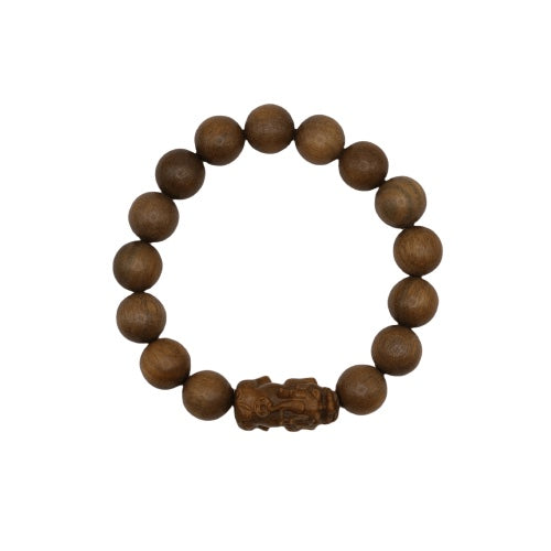 Bracelet: brown green sandalwood beads with one bead carved as a Pixiu, second view
