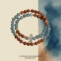 Bracelet: two strands, blue-green amazonite beads and brown wood beads, joined by a pale chalcedony ring