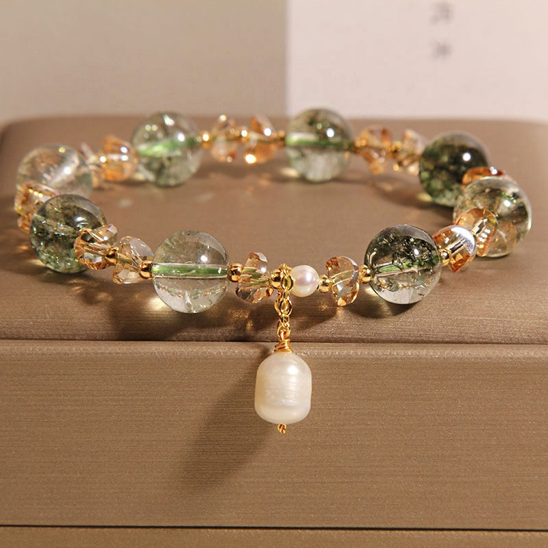 Bracelet: dark green phantom quartz beads with a white baroque pearl drop, second view