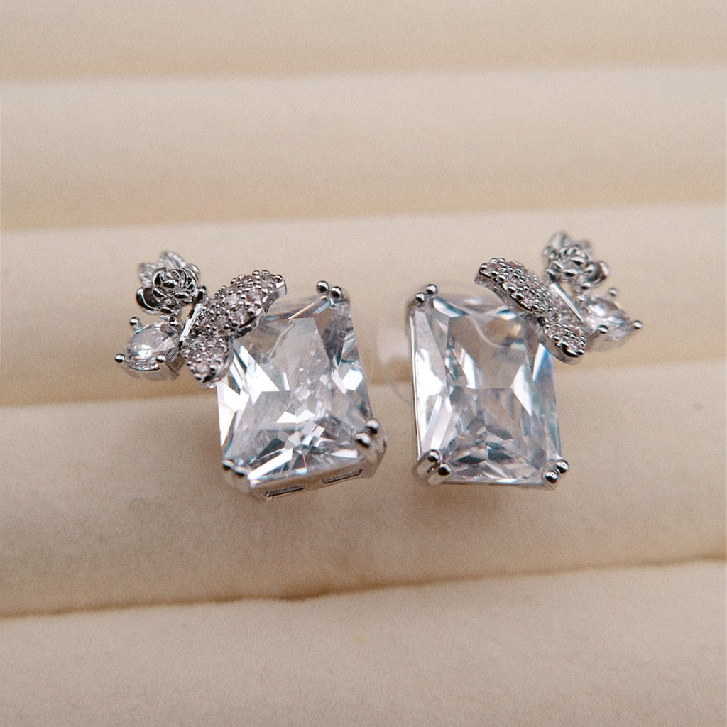 Earrings: clear emerald-cut cubic zirconia with butterfly and flower motifs, fourth view