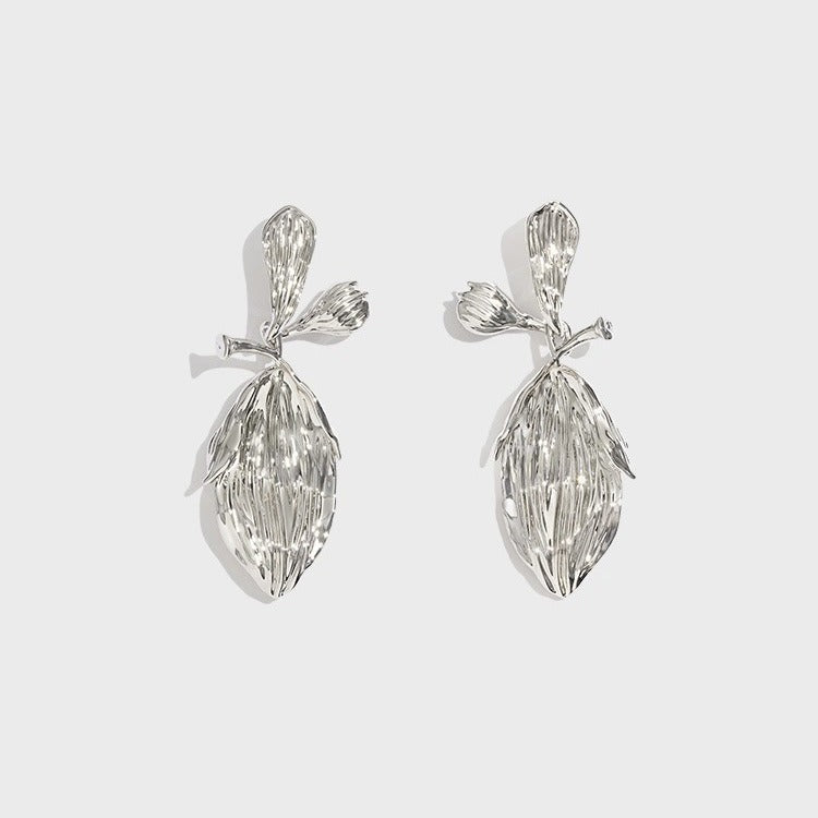Earrings: textured 925 sterling silver stud with a ribbed leaf-shaped drop, second view