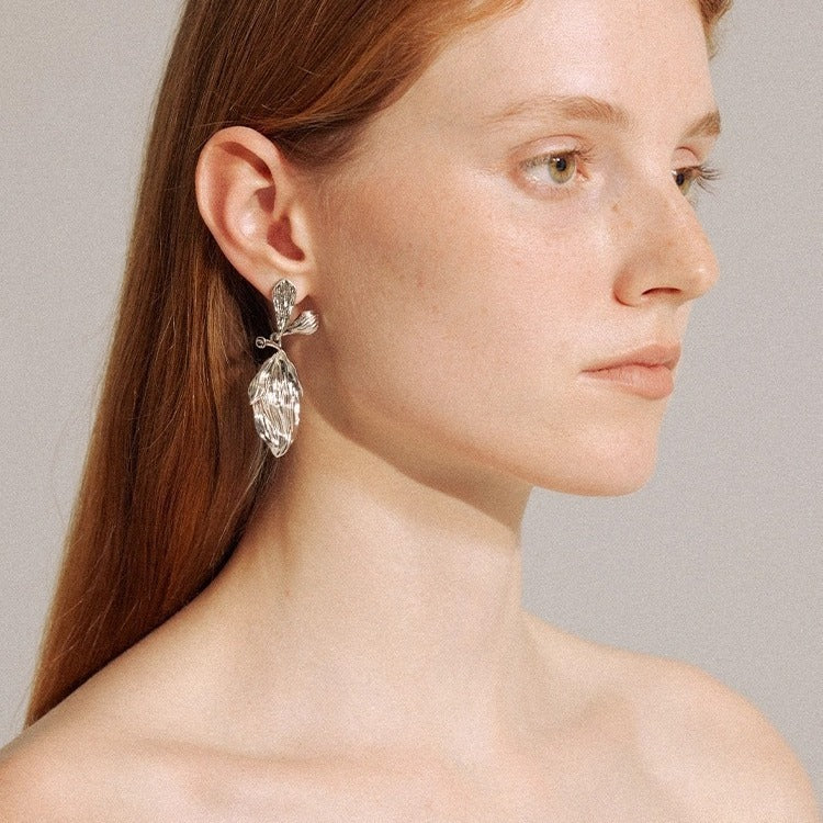Earrings: textured 925 sterling silver stud with a ribbed leaf-shaped drop, fourth view