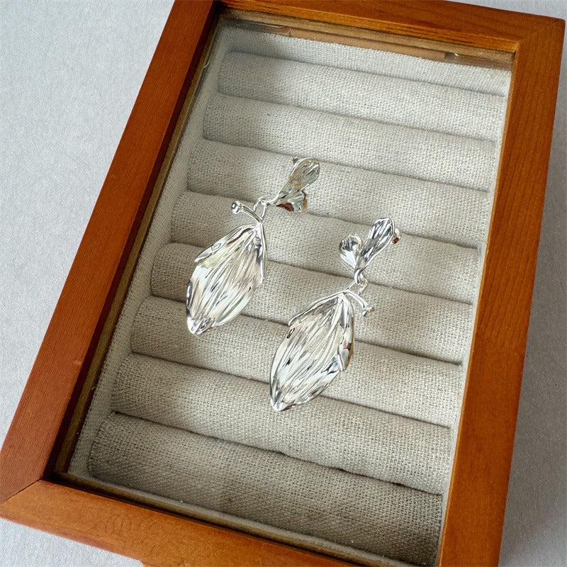 Earrings: textured 925 sterling silver stud with a ribbed leaf-shaped drop, sixth view