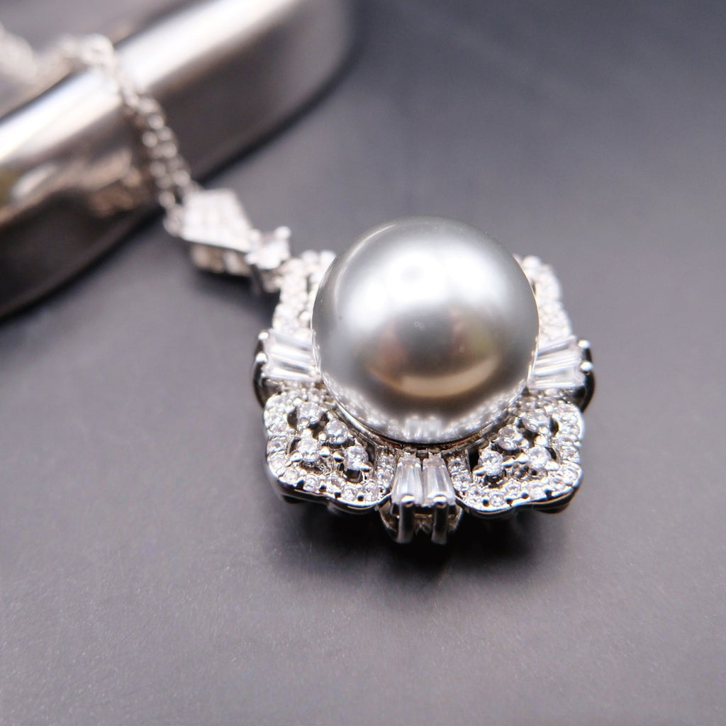 Necklace: grey 14mm cultured Tahitian pearl in a flower-shaped halo, second view