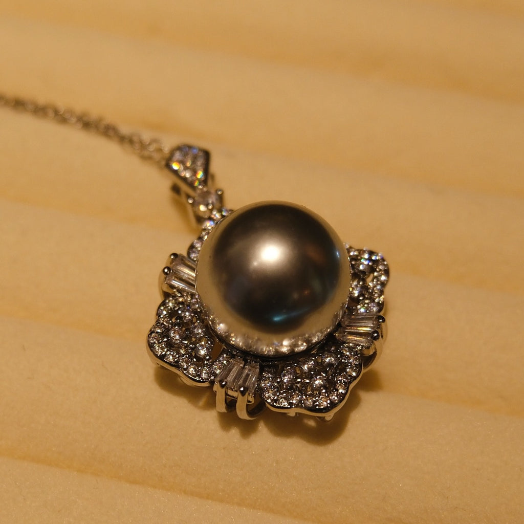 Necklace: grey 14mm cultured Tahitian pearl in a flower-shaped halo, third view