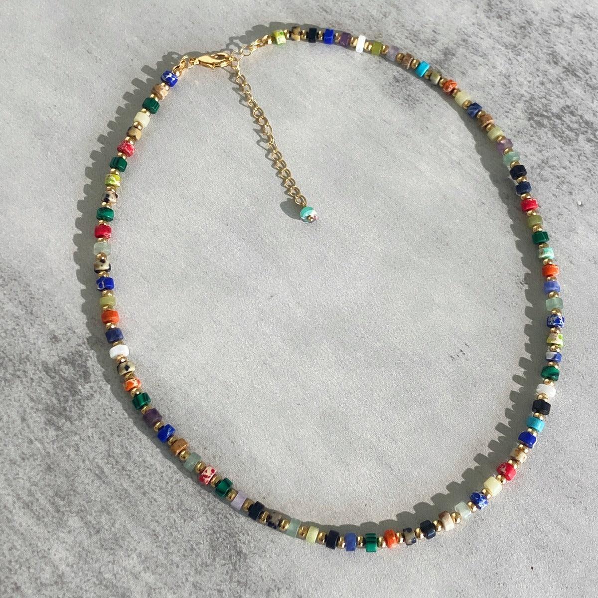 Necklace: strand of small multi-coloured mixed gemstone beads, fifth view