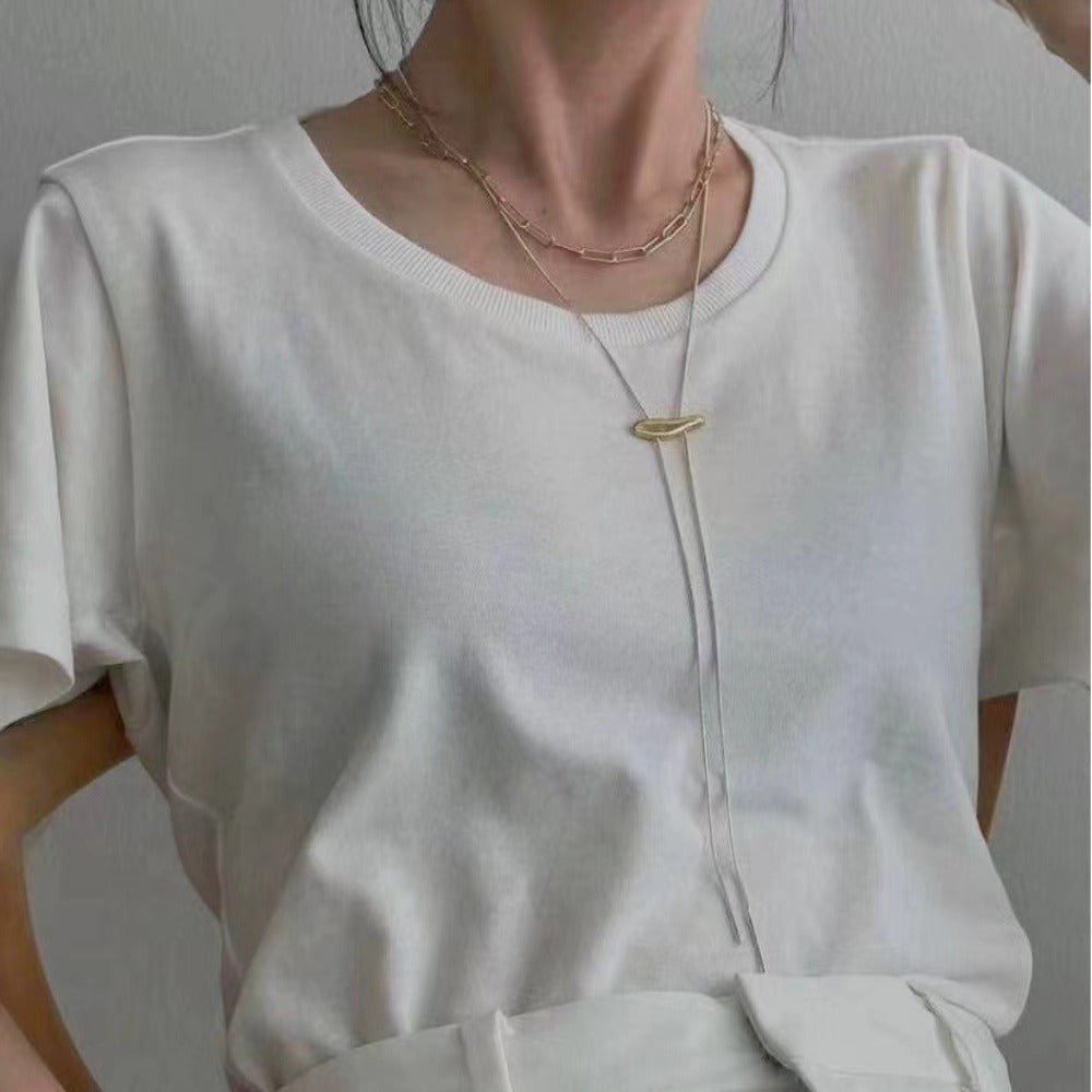 Necklace: silver-coloured snake chain with a gold-coloured slider bar, second view
