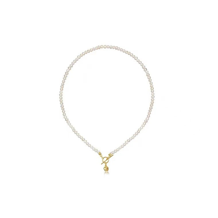 Necklace: strand of small ivory freshwater rice pearls, 3-4mm, second view
