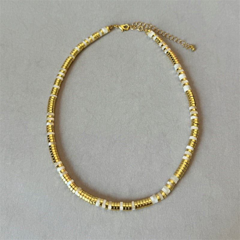 Necklace: white mother-of-pearl and gold plated disc beads, second view