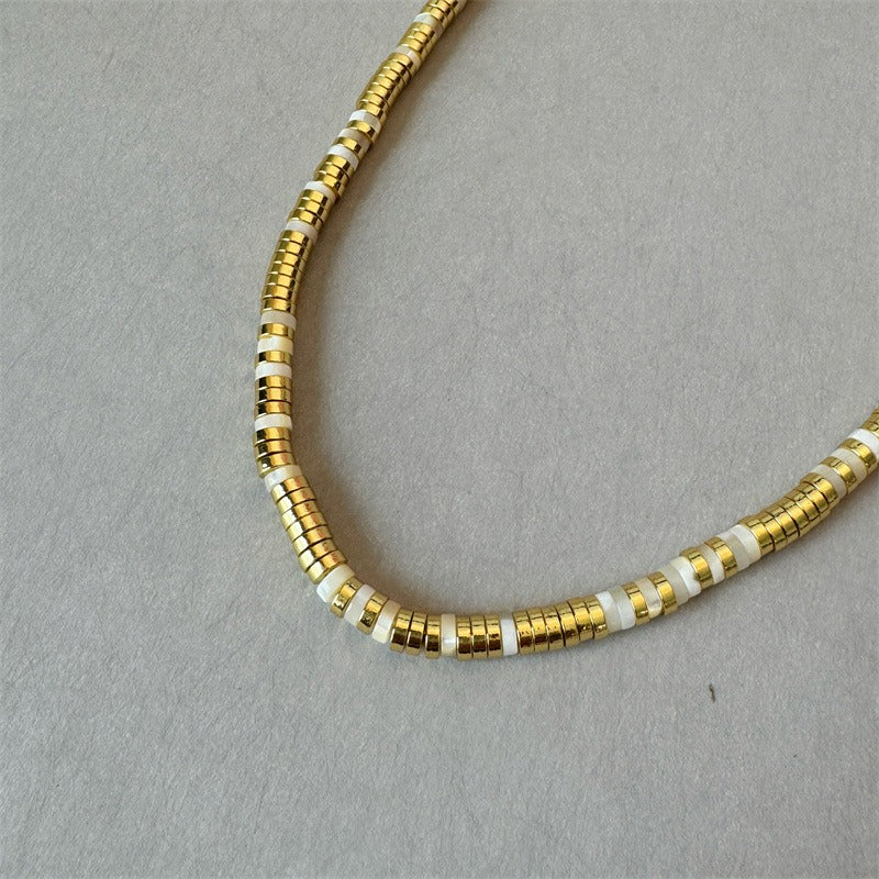Necklace: white mother-of-pearl and gold plated disc beads, fifth view