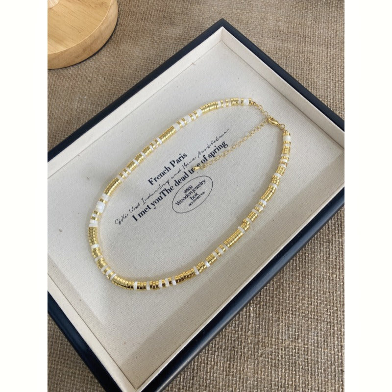 Necklace: white mother-of-pearl and gold plated disc beads, sixth view