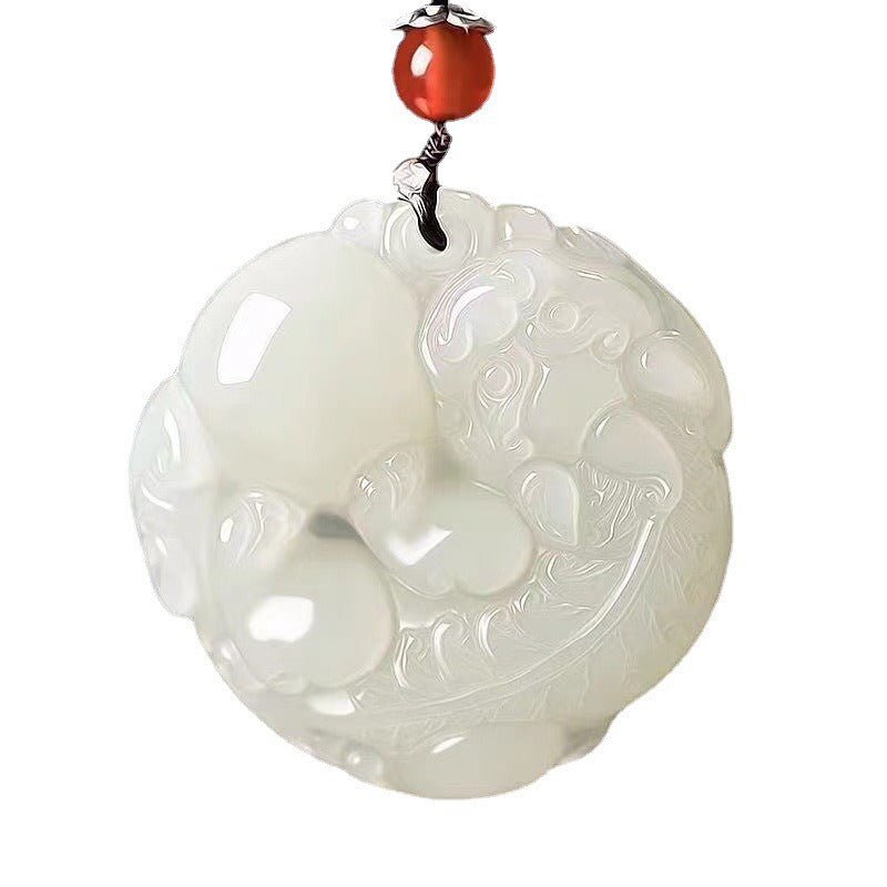 Pendant: white Hetian jade round medallion carved with a Pixiu, second view
