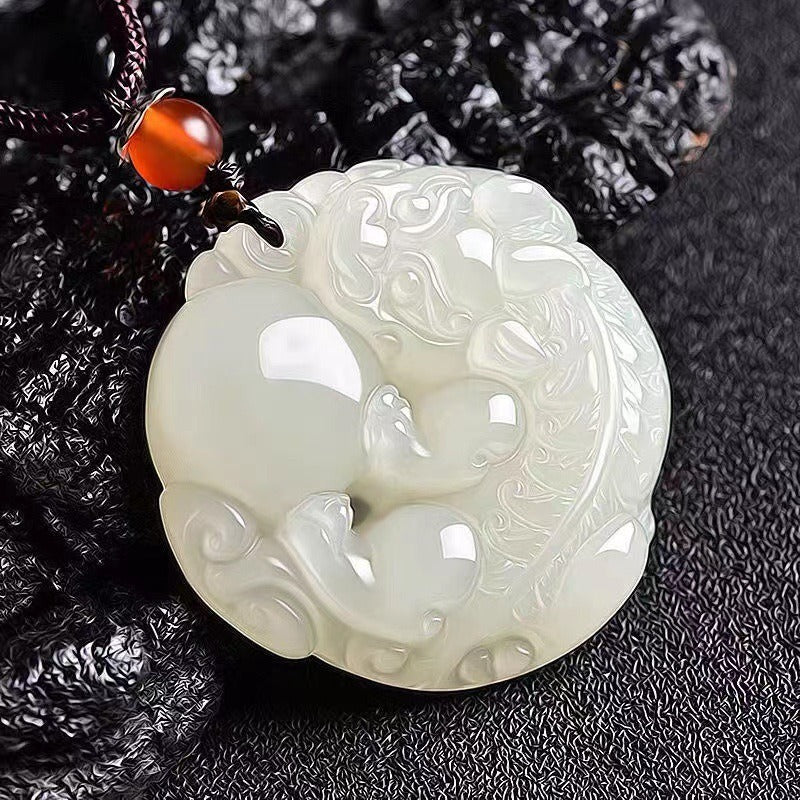 Pendant: white Hetian jade round medallion carved with a Pixiu, fifth view